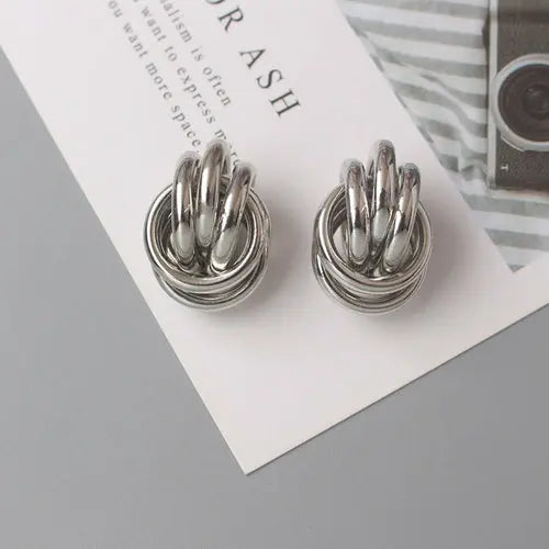 OH Fashion Twist Metal Stud Earrings for Women Hollow Geometric