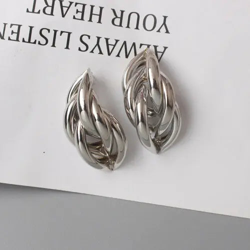 OH Fashion Twist Metal Stud Earrings for Women Hollow Geometric