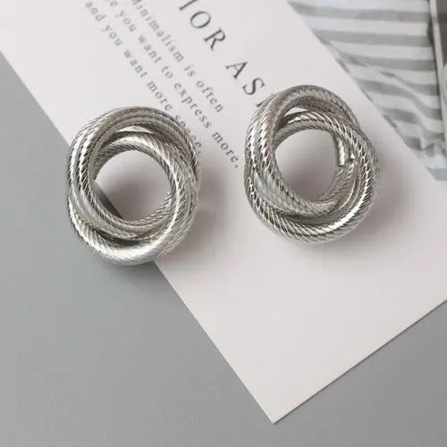 OH Fashion Twist Metal Stud Earrings for Women Hollow Geometric
