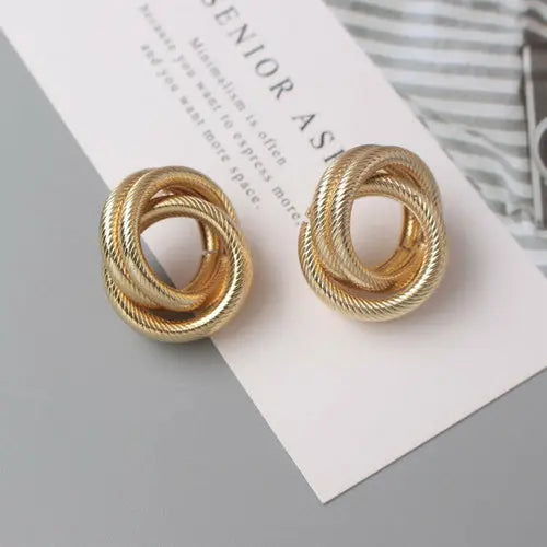 OH Fashion Twist Metal Stud Earrings for Women Hollow Geometric