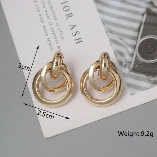 OH Fashion Twist Metal Stud Earrings for Women Hollow Geometric