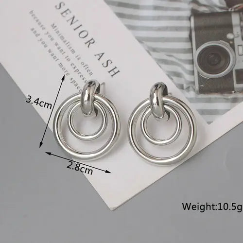 OH Fashion Twist Metal Stud Earrings for Women Hollow Geometric
