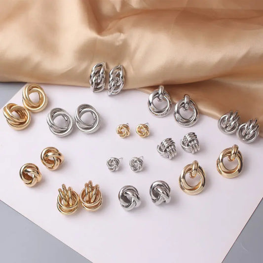 OH Fashion Twist Metal Stud Earrings for Women Hollow Geometric